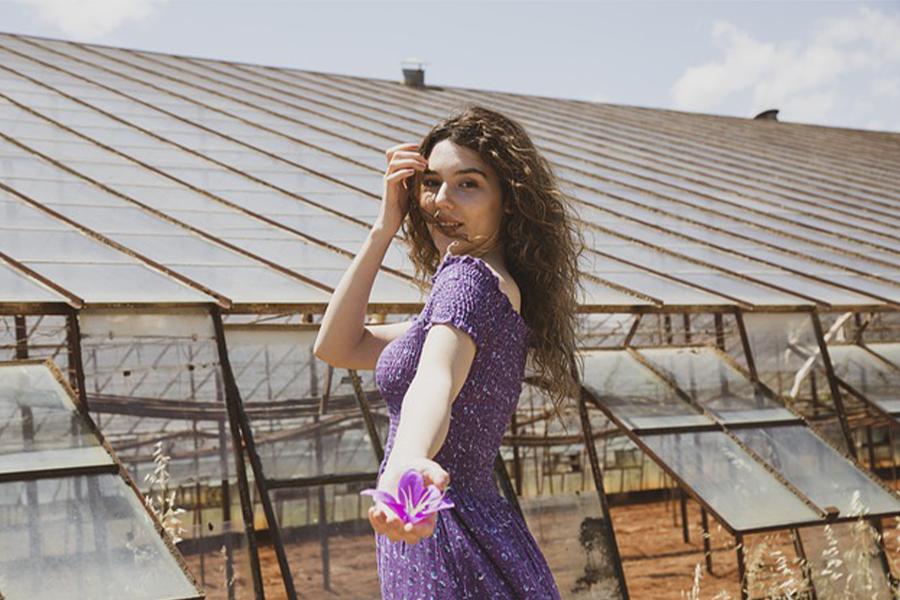 Woman wearing classic pink and purple