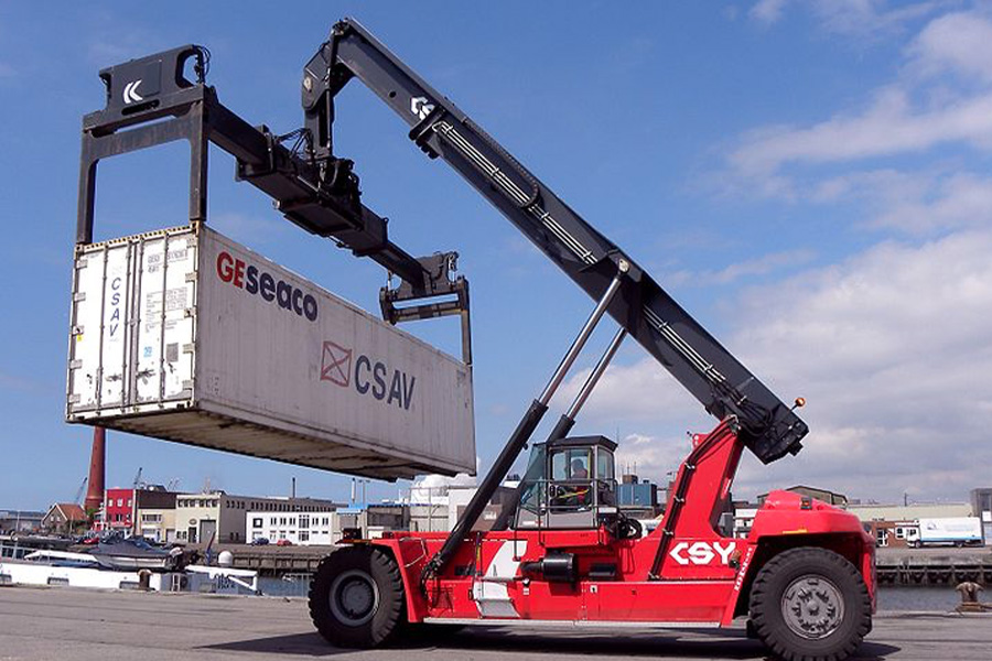 A reach stacker with container