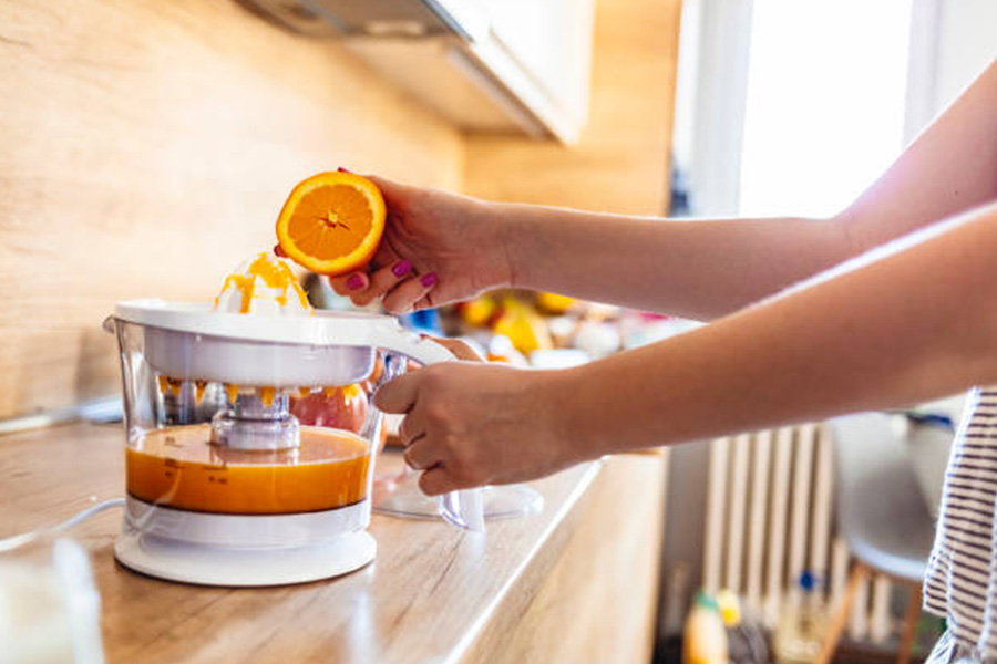 Alésoir électrique utilisé pour faire du jus d'orange