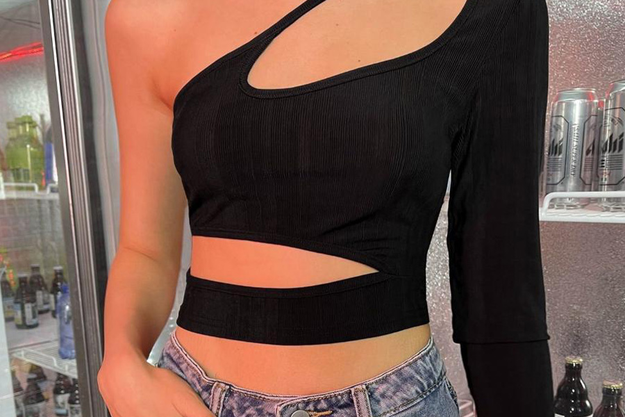 Woman in a black cutout top