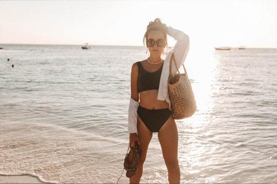 Woman with black tank top bikini